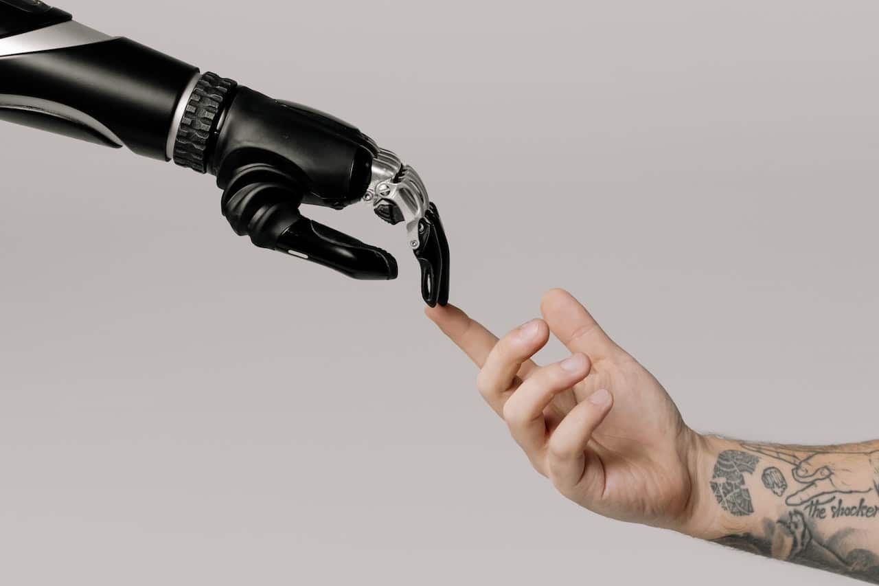 photo of an AI hand touching a human hand