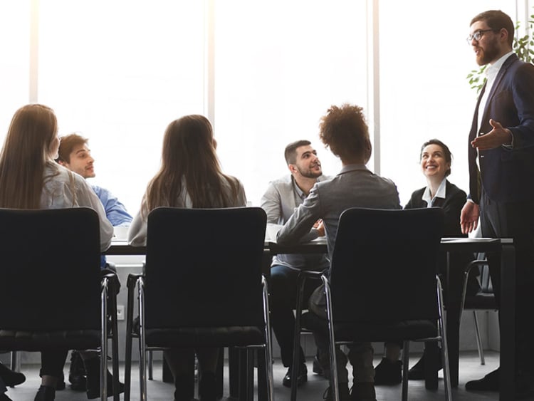 CEO speaking to his sales team