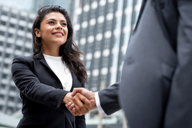 field marketing manager shaking client's hand