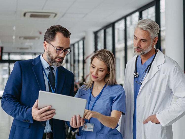 pharmaceutical sales rep talking with doctors