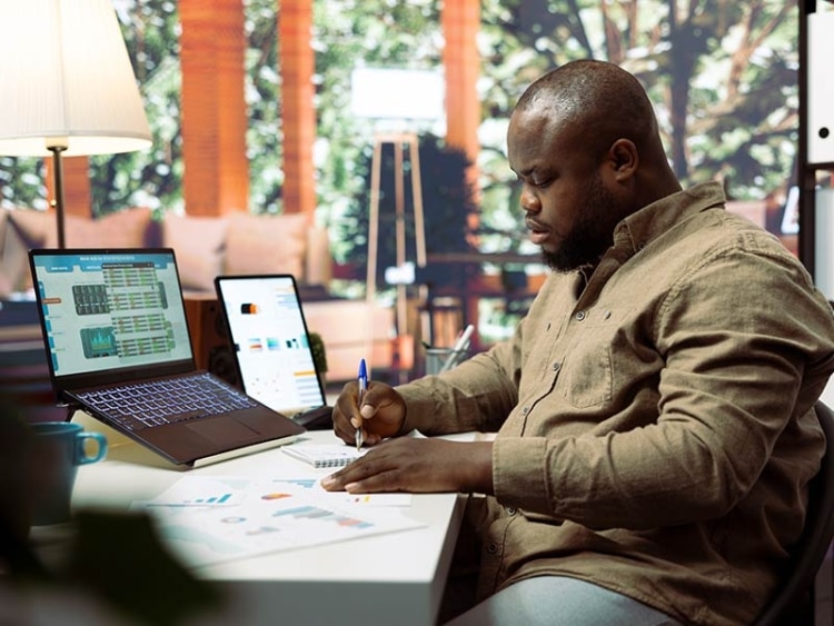 outside sales rep reviewing his forecast reports