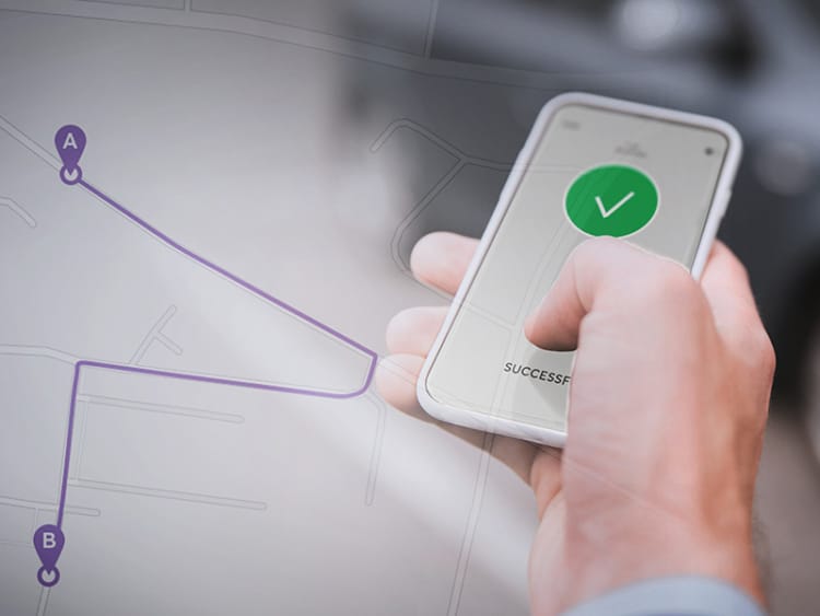 rep using a route optimization app on phone