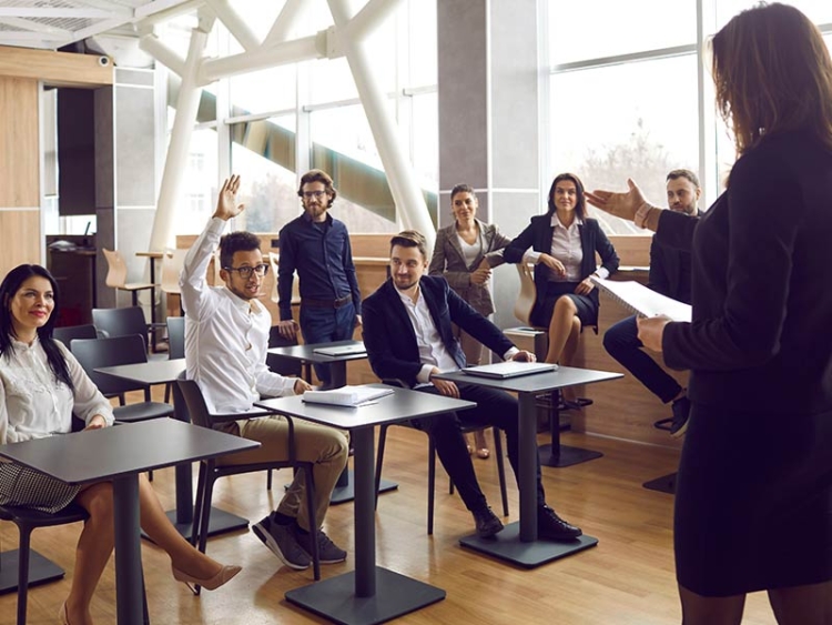 sales team reviewing pros and cons of software